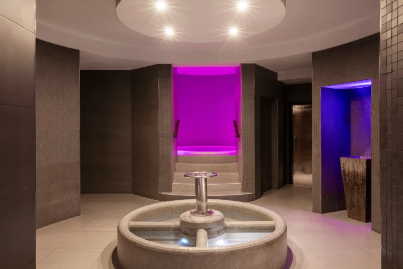 Spa area with central fountain and soft lighting for a wellness journey in a hotel in Sarzana - Sarzana Park Hotel, BZAR hotels in Liguria